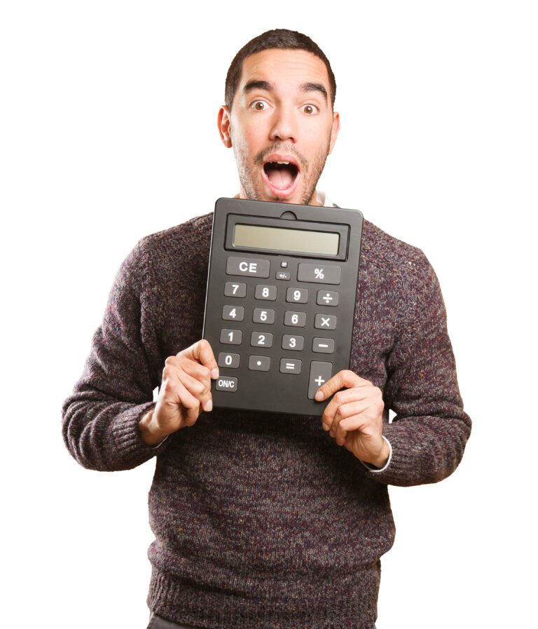 Surprised young man holding a calculator